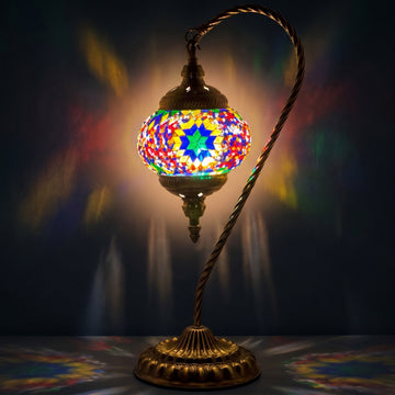 Yellow Swan Neck Handmade Mosaic Table Lamps mosaic glass table lamp — glowing against a deep charcoal background