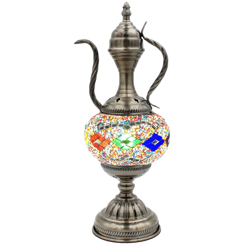a silver vase with a mosaic design on it