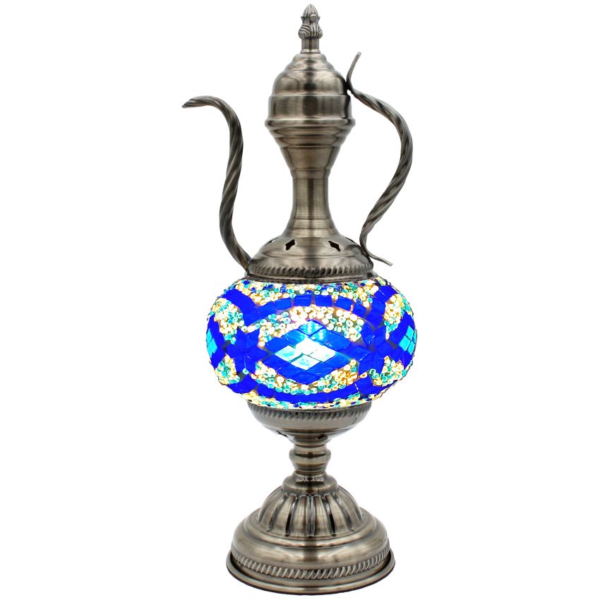 a silver vase with a blue and white design on it