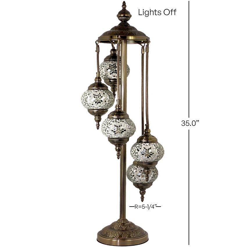 a three light floor lamp with three globes on it