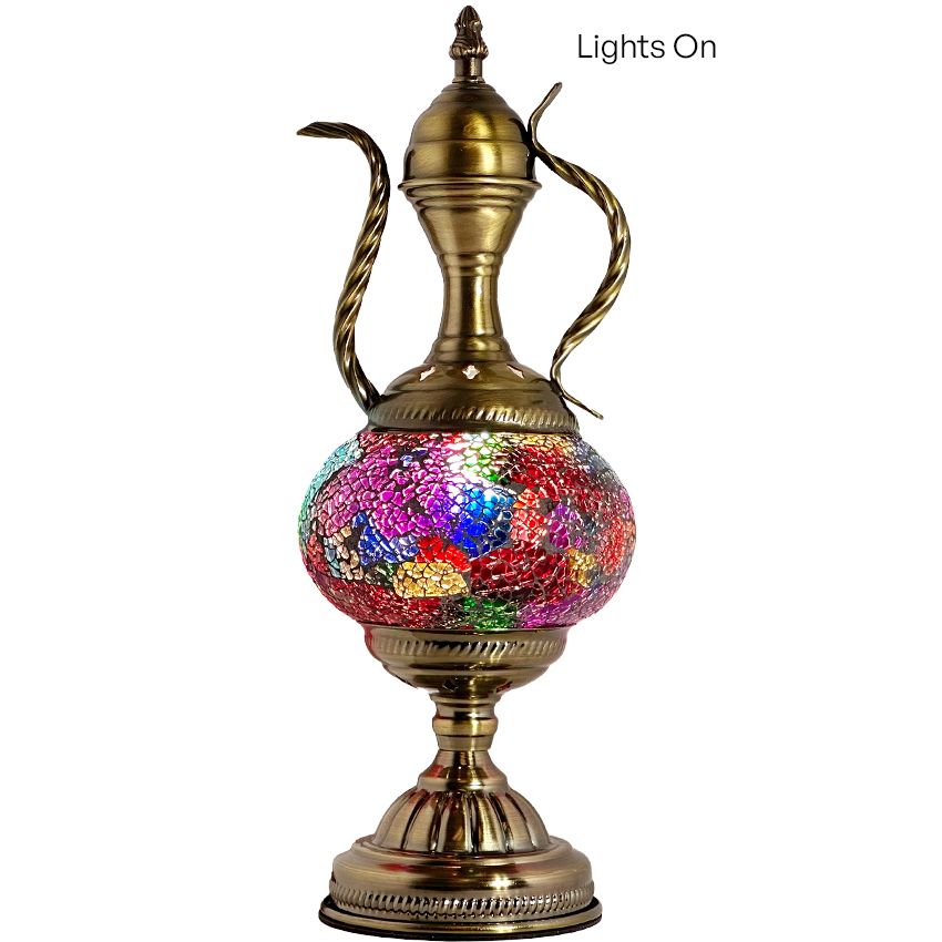 a gold colored vase with a colorful design on it