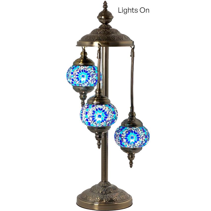 a table lamp with three lights on top of it