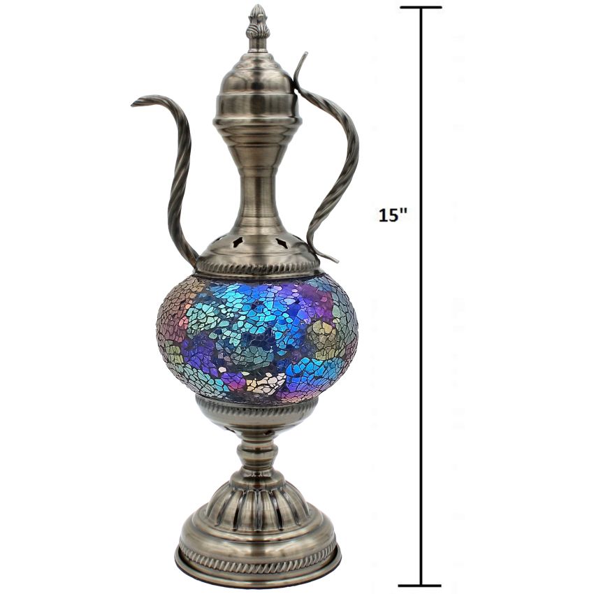 a silver vase with a blue and purple design on it