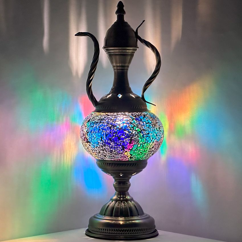 a black vase with a colorful design on it