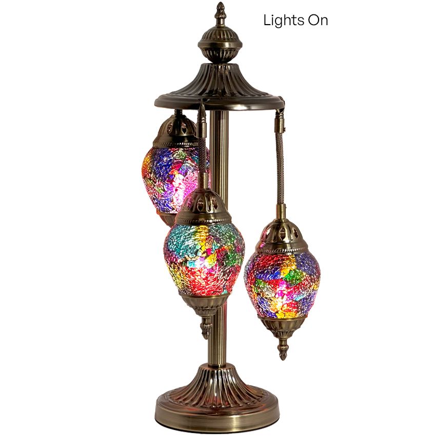 a multicolored lamp with three lights on it