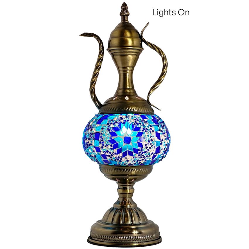 a blue and white vase sitting on top of a table