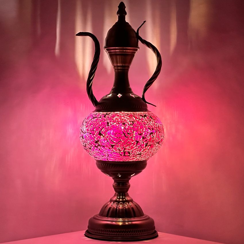 a vase with a pink light inside of it