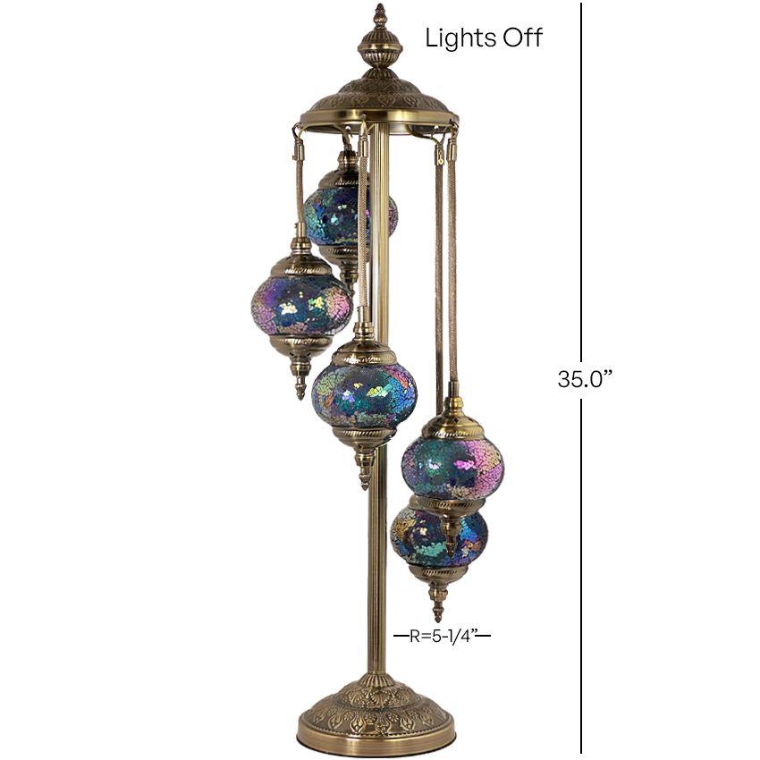 a brass colored lamp with four colorful glass balls on it