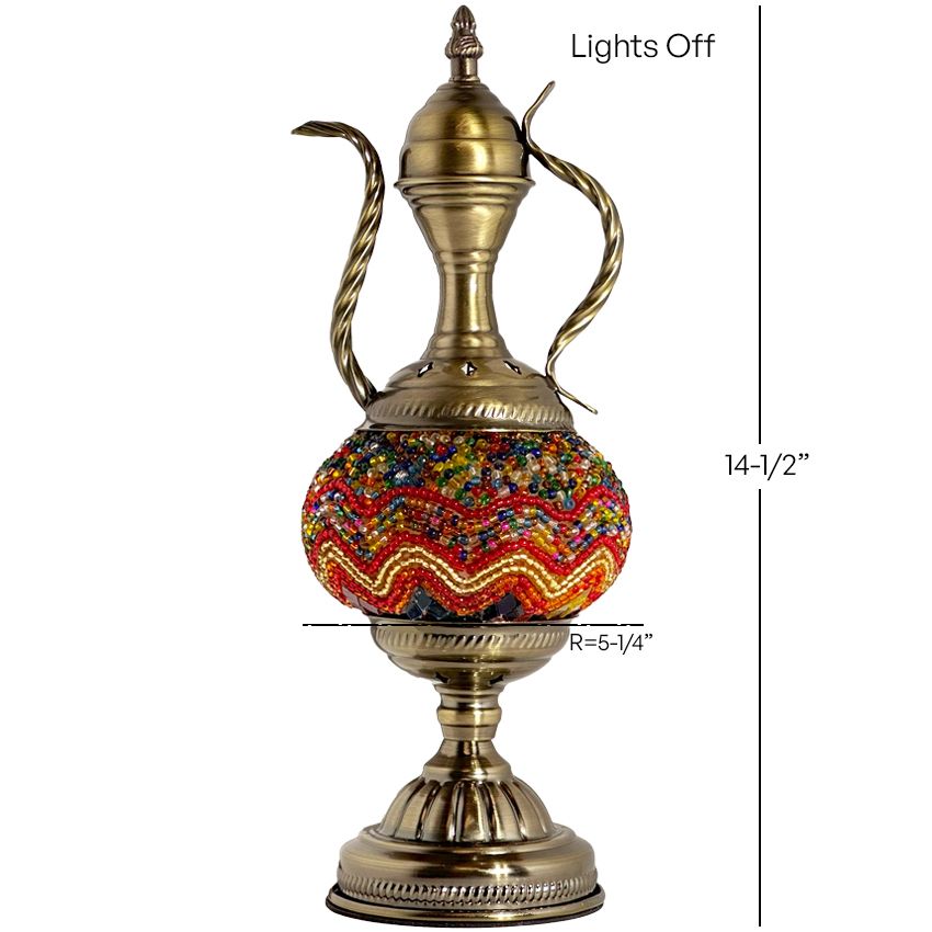 a golden vase with a colorful design on it